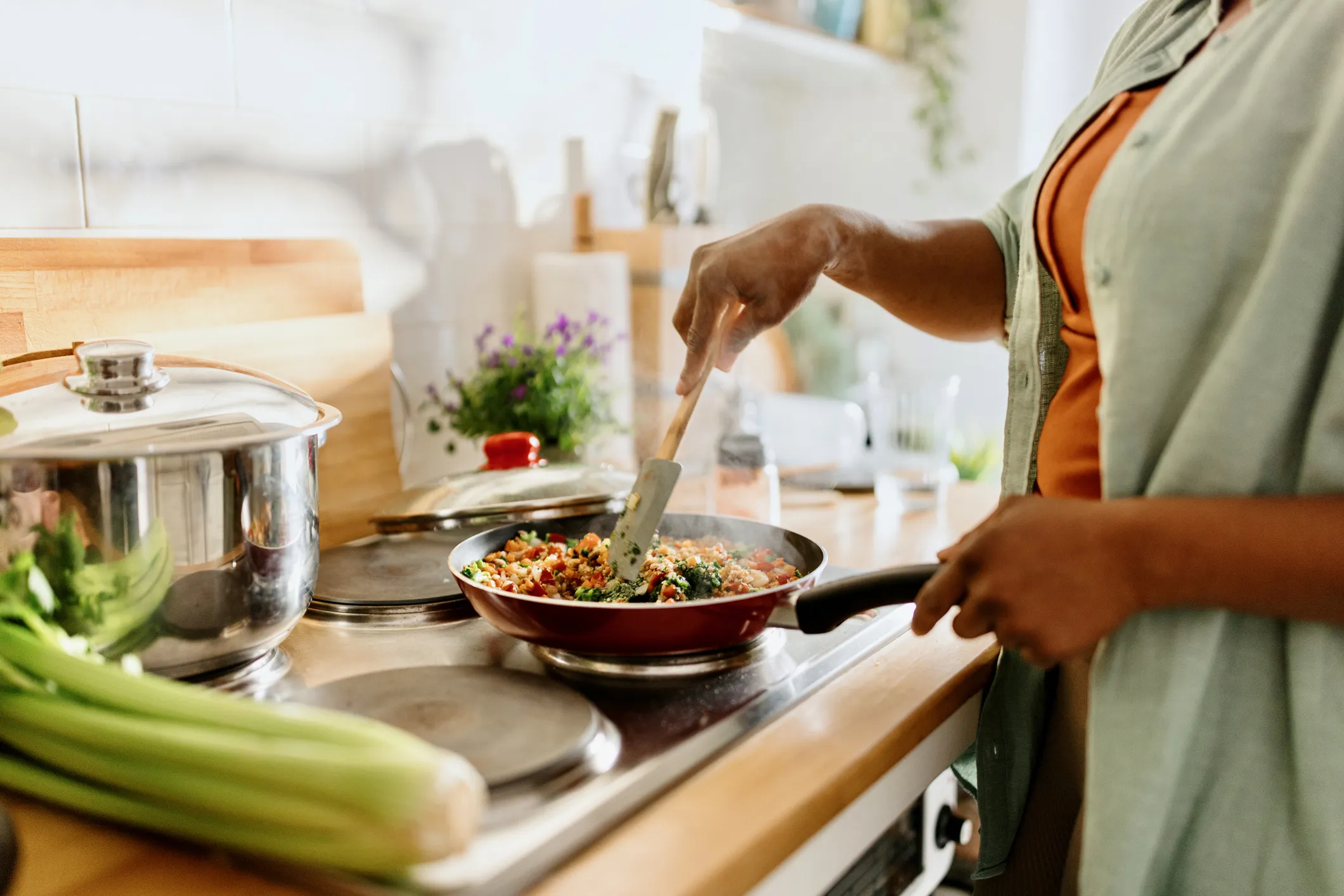 Culinary team preparing plant-forward dishes in a hospital kitchen